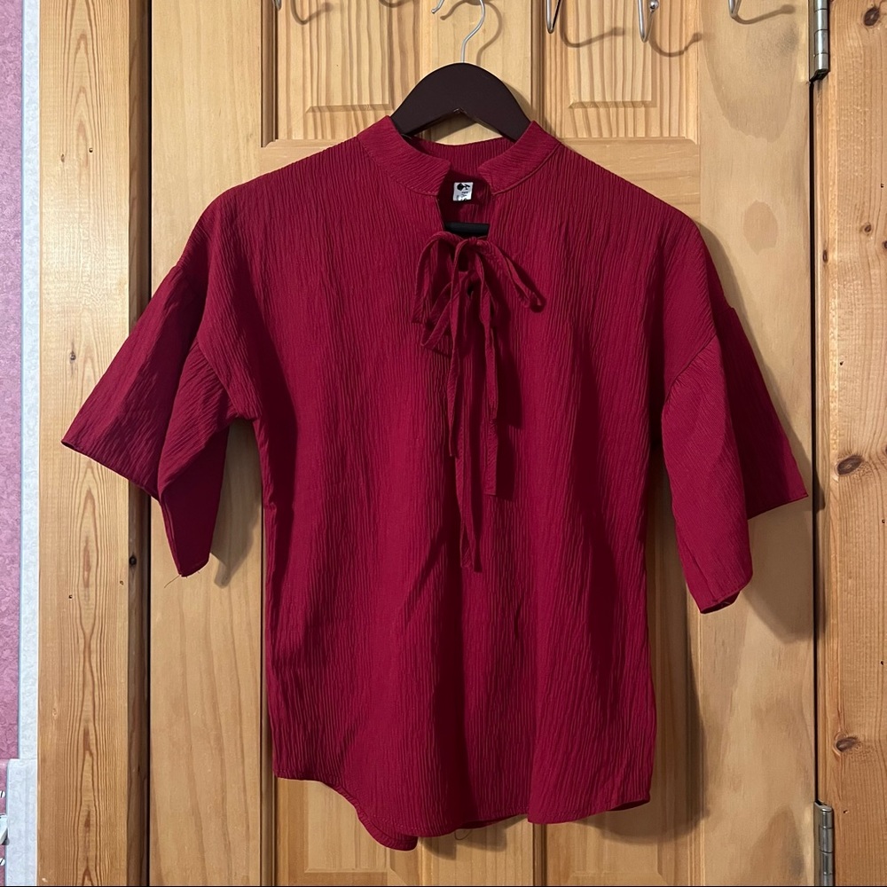 wine red tie-neck blouse